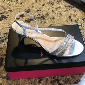 Brand new. Never worn heels.